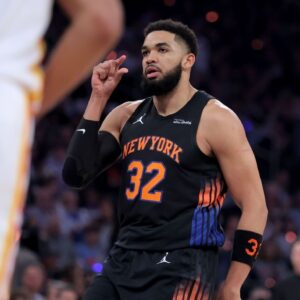 Karl-Anthony Towns flexing after a drive against the Atlanta Hawks in the Knicks playoff game
