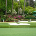 Augusta National grounds crew performing nightly turf restoration after the Masters tournament