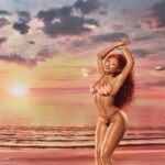 Megan Thee Stallion modeling her Hot Girl Summer swimwear collection at Walmart