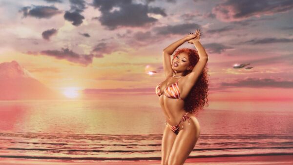 Megan Thee Stallion modeling her Hot Girl Summer swimwear collection at Walmart
