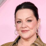 Melissa McCarthy wearing a stunning curve-hugging gown at a Los Angeles red carpet event