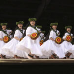 Crowd and performers at the Merrie Monarch Festival hula competition in Hilo, Hawaii