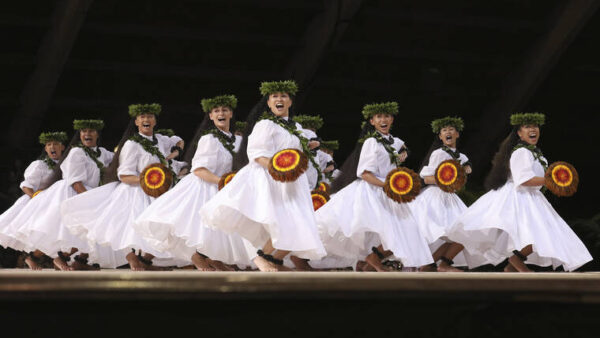 Crowd and performers at the Merrie Monarch Festival hula competition in Hilo, Hawaii