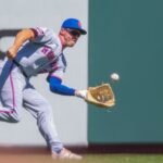 New York Mets player Jared Young injured on field with knee brace
