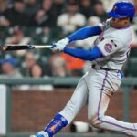 New York Mets outfielder Juan Soto walking off field with apparent calf injury