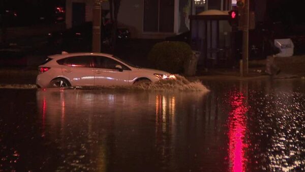 Flood damage on South Fulton Street in Milwaukee's Bay View neighborhood after recent storms