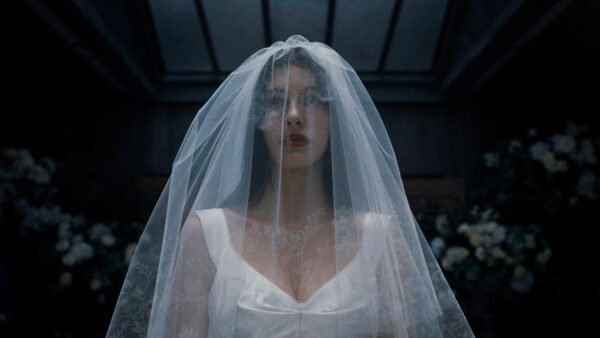 Camila Morrone as Rachel in Netflix's Something Very Bad Is Going to Happen finale scene