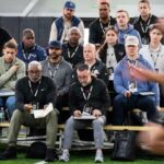 NFL scouts analyzing 2026 draft prospects and top 10 pick predictions