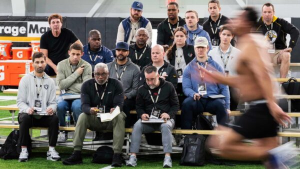 NFL scouts analyzing 2026 draft prospects and top 10 pick predictions