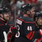 NHL playoffs sudden death 5-on-5 overtime format graphic showing players on ice