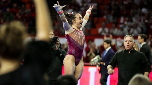Oklahoma gymnast Faith Torrez celebrates winning the NCAA all-around title