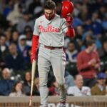Philadelphia Phillies players dejected after losing 8th straight game 7-2 to Chicago Cubs at Wrigley Field