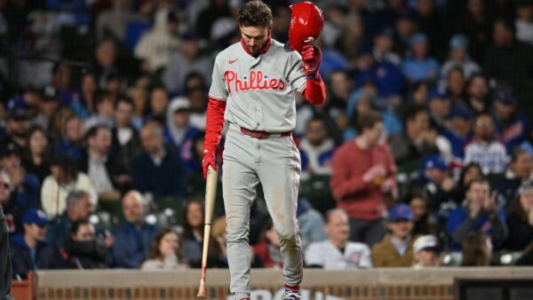 Philadelphia Phillies players dejected after losing 8th straight game 7-2 to Chicago Cubs at Wrigley Field