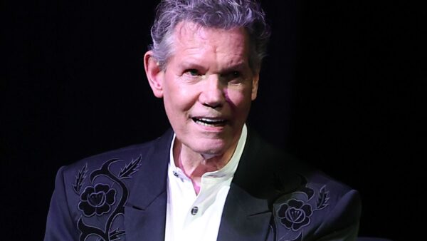 Randy Travis receives a standing ovation on stage during his More Life tour