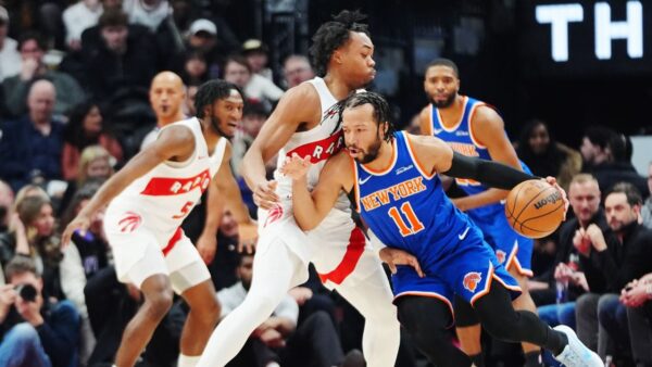 Toronto Raptors player celebrating a win, representing playoff clinching scenario