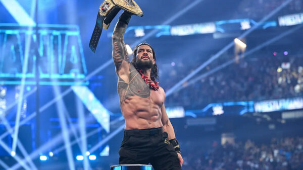 Roman Reigns holding the World Heavyweight Championship on WWE Raw after WrestleMania 42