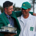 Rory McIlroy and caddie Harry Diamond celebrate 2025 Masters win