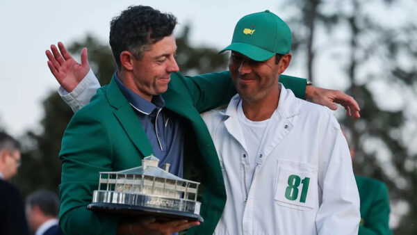 Rory McIlroy and caddie Harry Diamond celebrate 2025 Masters win