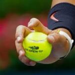 Andrey Rublev playing a forehand at the Barcelona Open tennis tournament