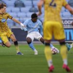 Ryan McAidoo celebrating his goal for Manchester City in the FA Youth Cup semi-final