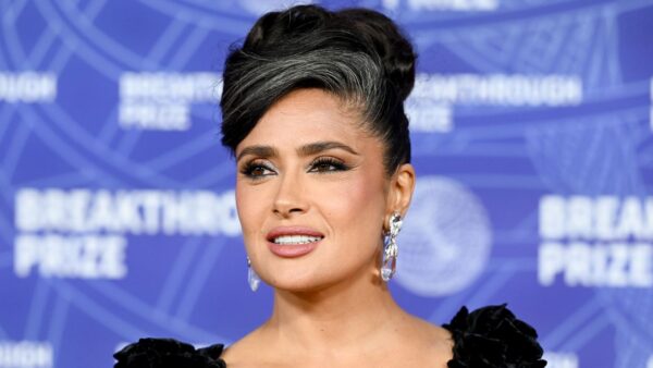 Salma Hayek silver hair updo at Breakthrough Prize ceremony in black Gucci gown