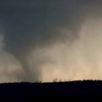 Severe weather map showing storm threat area for tornadoes and monster hail across Central US