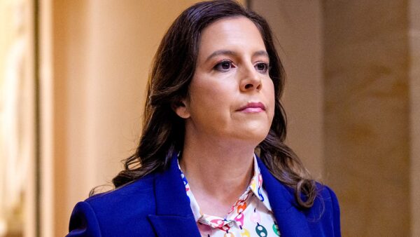 Rep. Elise Stefanik holding her new book 'Poisoned Ivies' about the 2023 campus antisemitism hearing