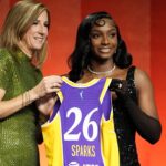 Ta'Niya Latson in her vintage Hollywood-inspired outfit on the WNBA draft orange carpet