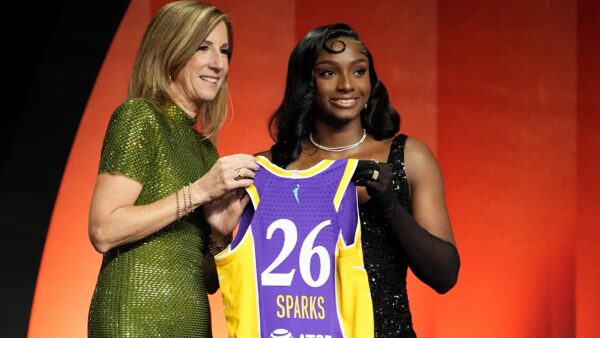 Ta'Niya Latson in her vintage Hollywood-inspired outfit on the WNBA draft orange carpet