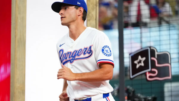 Texas Rangers vs Cincinnati Reds players in action during Sunday MLB game at Globe Life Field
