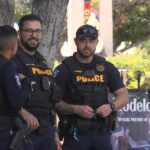 Tucson police officers preparing security for Arizona Wildcats Final Four game on University Boulevard