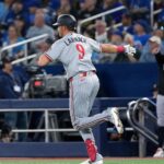 Minnesota Twins left-handed corner outfielders analysis graphic showing roster debate
