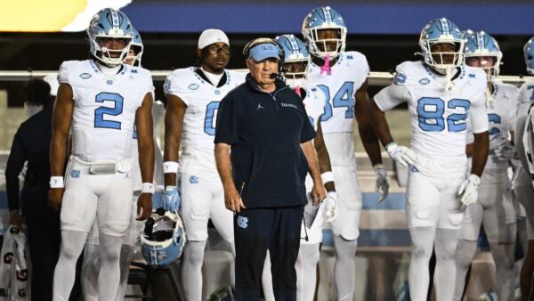 UNC football head coach Bill Belichick overseeing team nutrition program in the lunchroom