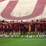 Universitario de Deportes players face off against Deportes Tolima in a Copa Sudamericana match