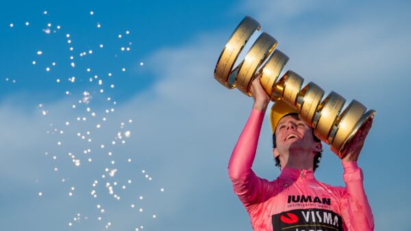 Warner Bros. Discovery logo and Giro d'Italia cycling race broadcast graphic
