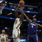 Golden State Warriors center Charles Bassey driving to the basket in an NBA game