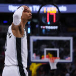 Victor Wembanyama celebrating a play for the San Antonio Spurs, symbolizing championship potential