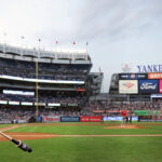 New York Yankees ace pitcher Max Fried winds up for a pitch during a game