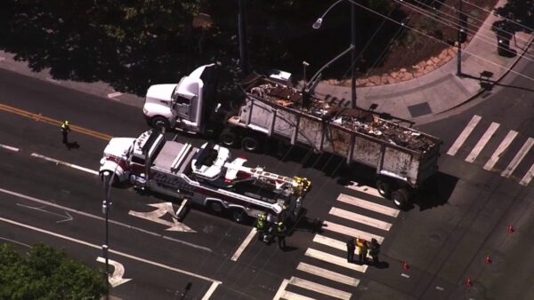 Damaged Scrap Metal Truck Disrupts Traffic and Causes Power Outage