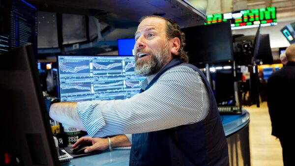 Stock Market Surges: Dow Hits Record Close Amid Economic Tensions